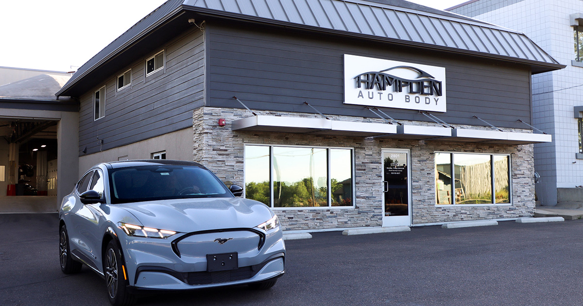 Hampden Auto Body - Shop building photo with Ford Mustang